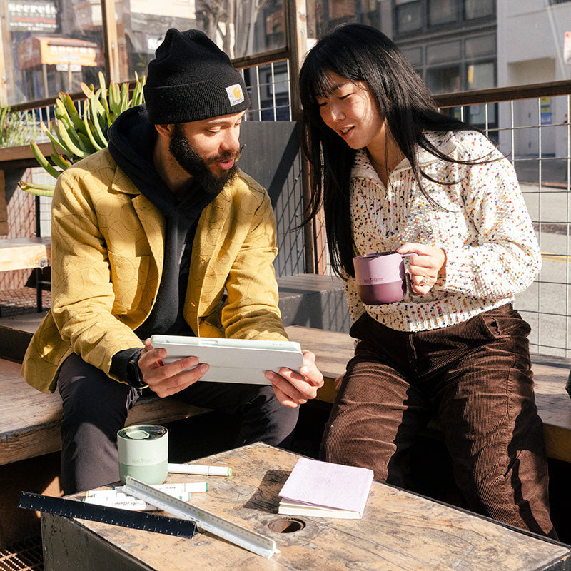 12oz-rise-mug-h5 12oz_rise_coffee_mug_dusty_orchid_couple_city_patio_square.jpg