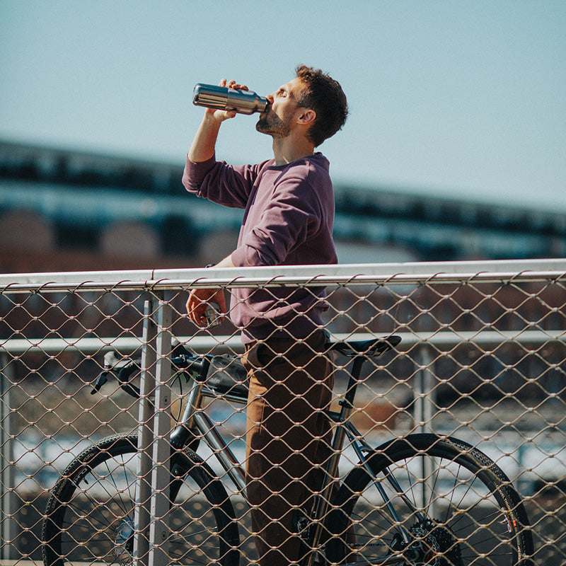 20oz-rise-reflect-with-bamboo-cap-e9 16oz_rise_reflect_man_bike_square.jpg