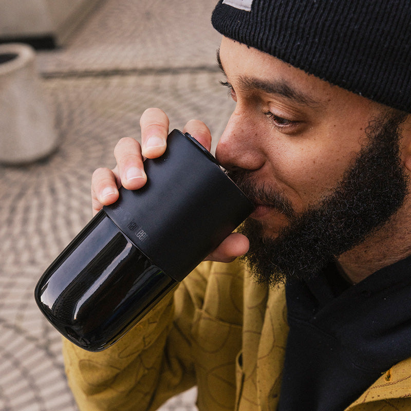 daily-on-the-go-set-h9 16oz_rise_tumbler_black_man_drink_square.jpg