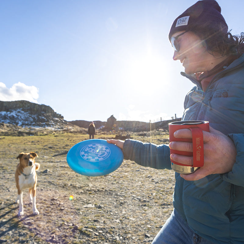 12oz-camp-mug-w9 insulated_camp_mug_12oz_woman_dog_frisbee_square.jpg