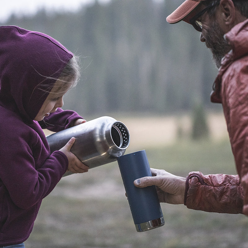 64oz-tkwide-with-loop-cap-d5 tkwide_64oz_bottle_girl_dad_filling_square.jpg